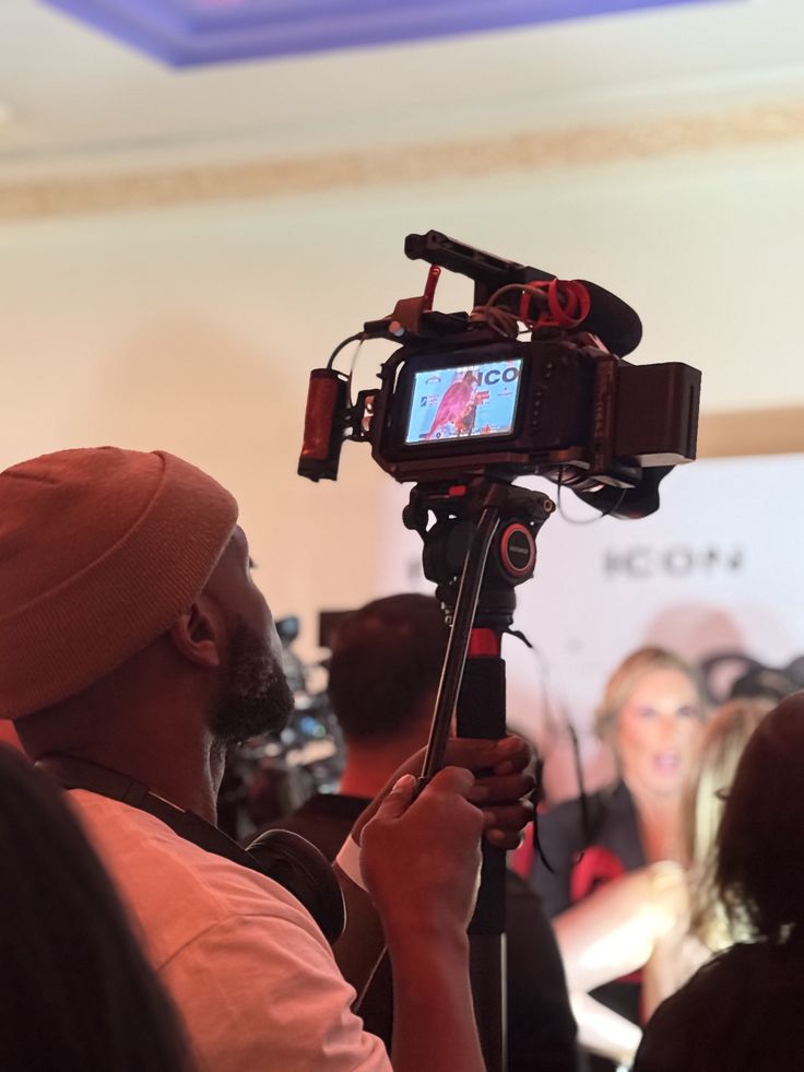 Camera operator filming a Limbofest concert production